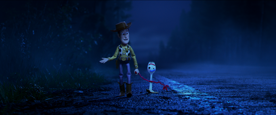 Toy-Story-4-woody-forky-walking-on-road